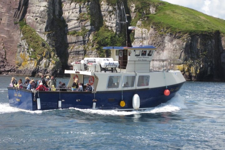 a small boat in a large body of water