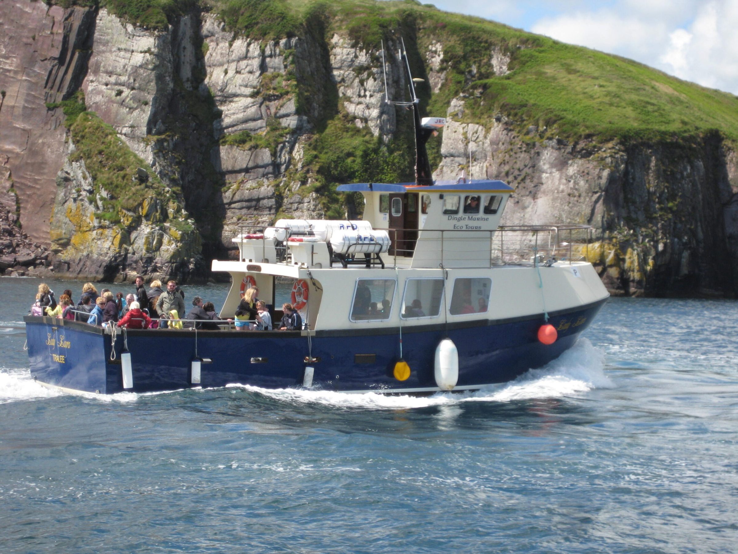 a small boat in a large body of water