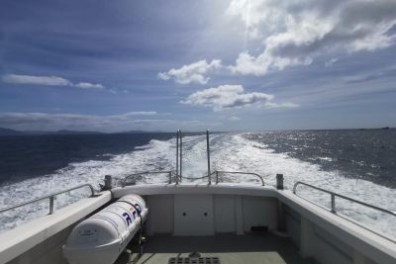 a view of a boat on a body of water
