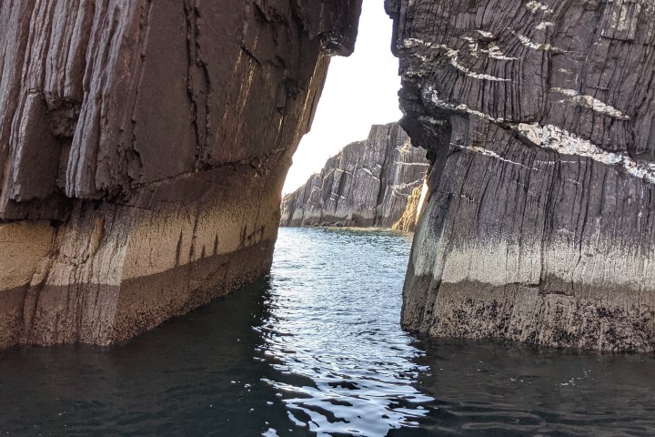 a stone landscape over water