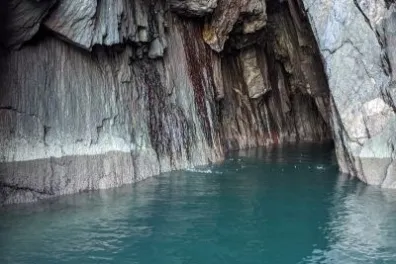 water next to the rocky landscape
