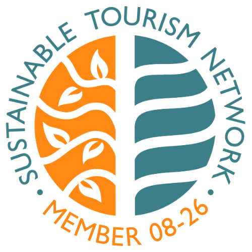 Sustainable Tourism Network badge with tree and leaf design, labeled Member 08-26.