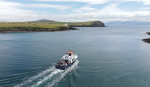 Boat sailing through a bay