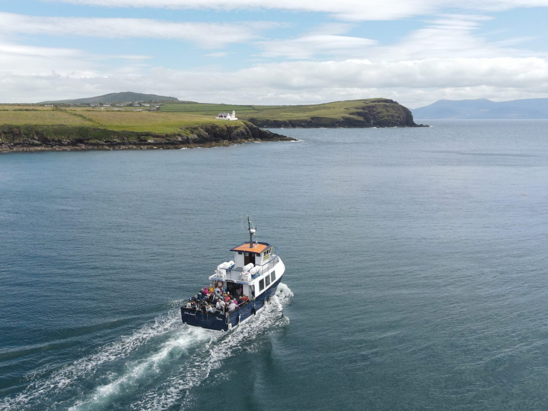 Boat sailing through a bay