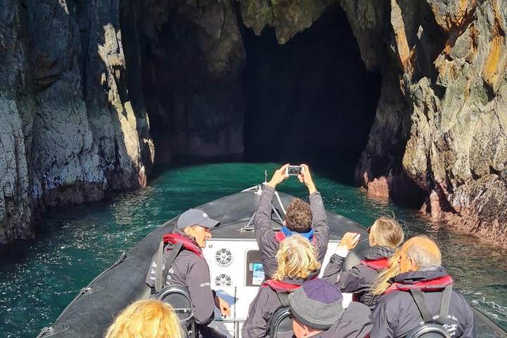 a person sitting on a rock