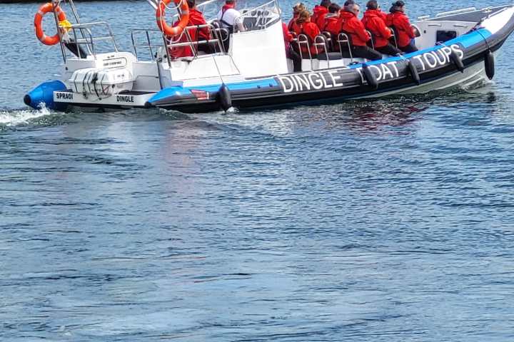 a boat is docked next to a body of water