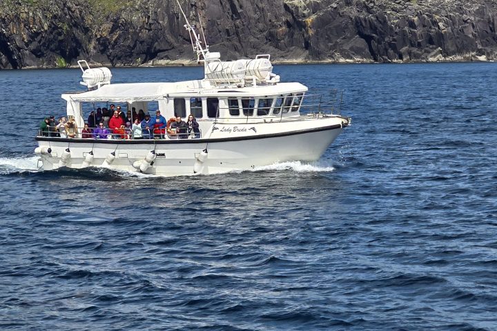 a small boat in a large body of water