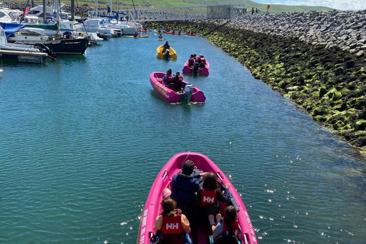 a small boat in a body of water